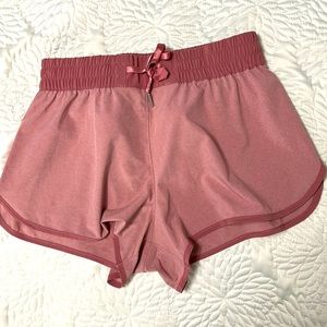 Size 6 Dusty pink women’s shorts. Never worn.